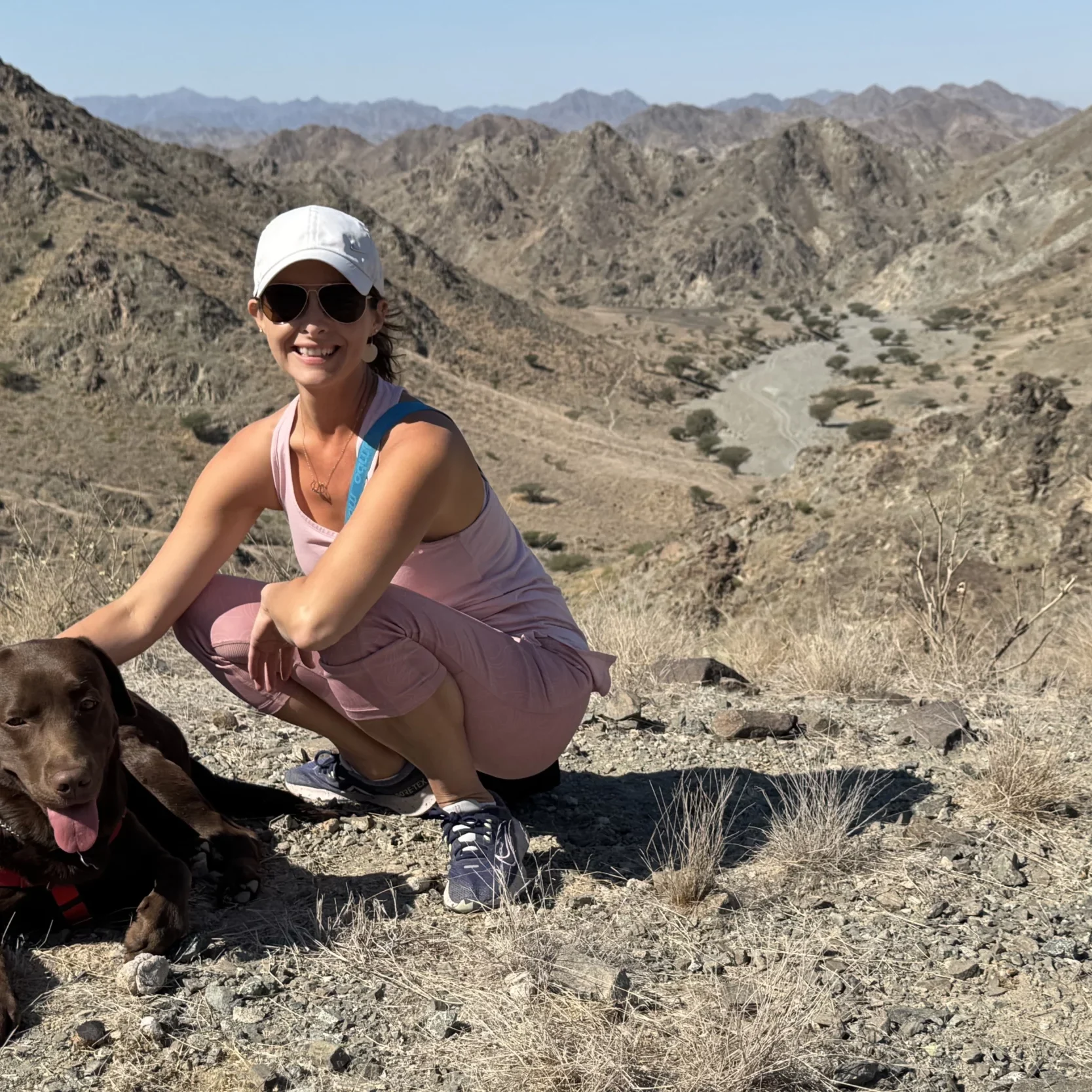 IMG_4326 Ellie with her dog hiking mountains after being disabled